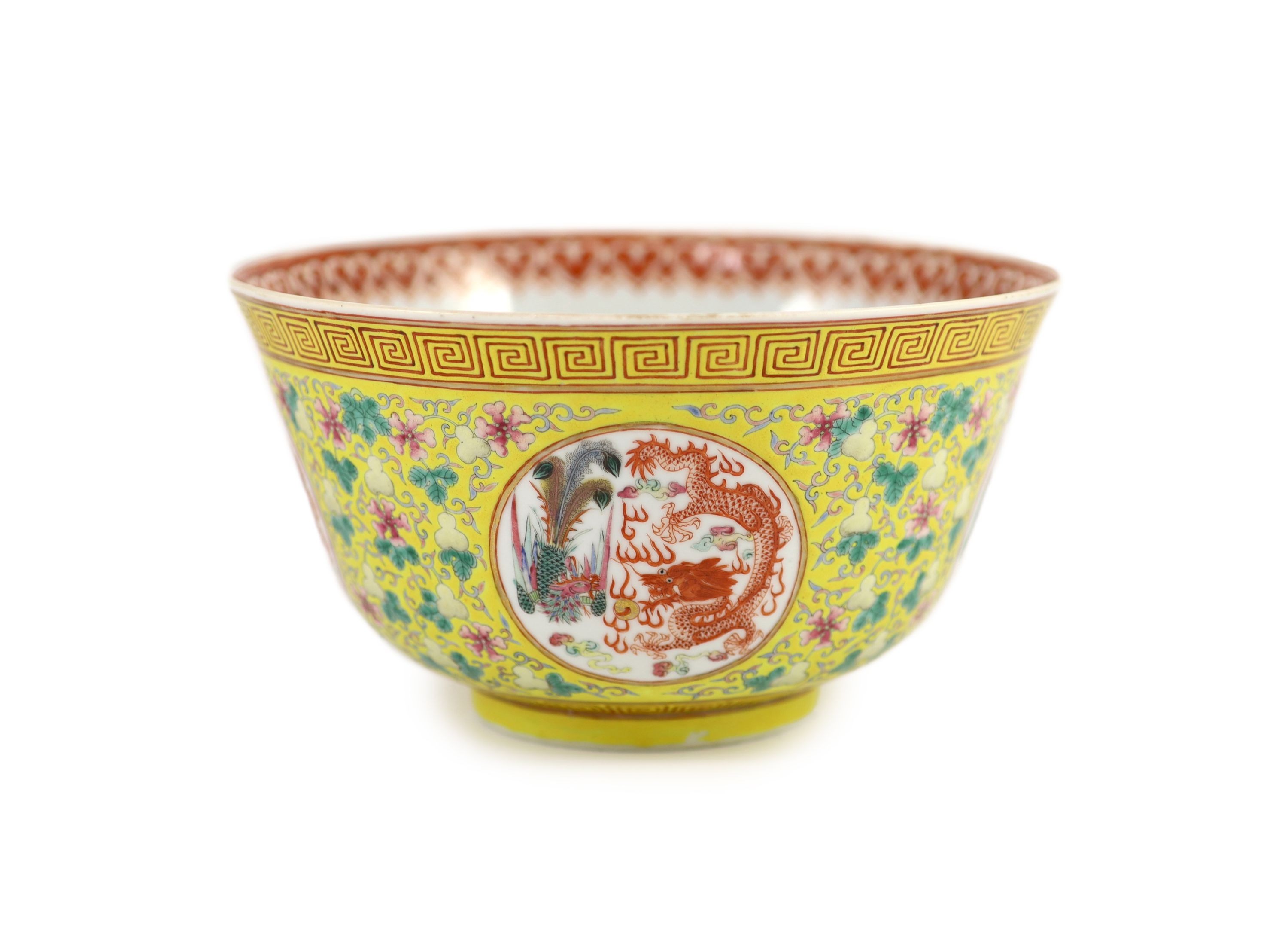 A fine Chinese yellow ground 'dragon and phoenix' medallion deep bowl, Guangxu mark and period (1875-1908), 20.6 cm diameter, 11.2 cm high, gilding to rim worn